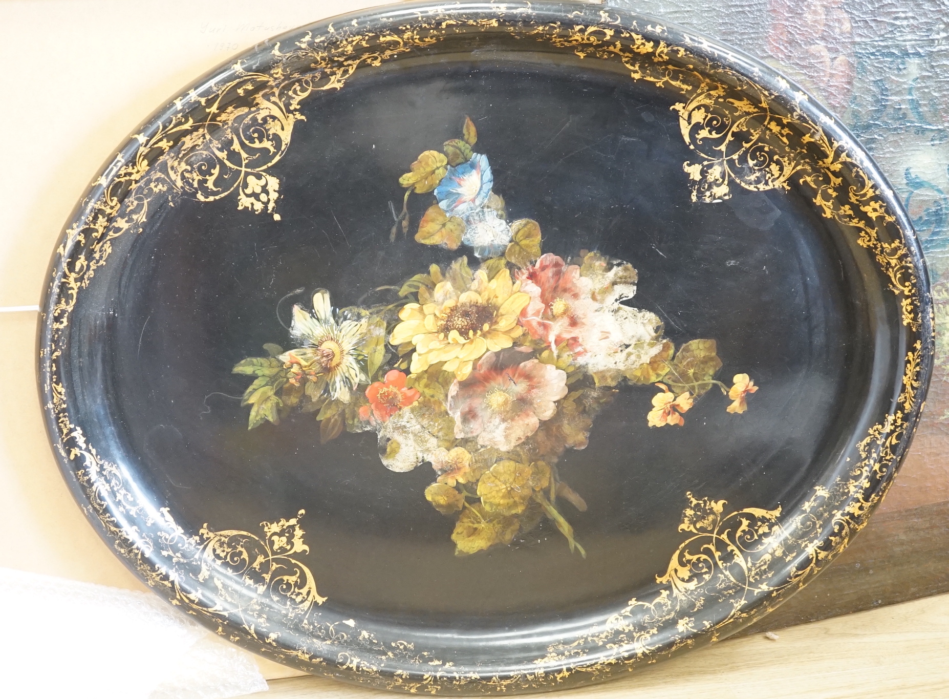 A Victorian oval papier maché oval tray, inscribed to reverse ’G & J Dean, 46 King William Street London-Bridge’, with registration mark, 30.5cm wide